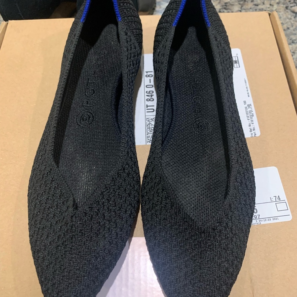 Rothy's Black Flats with Elegant Pointed Toe and Breathable Knit